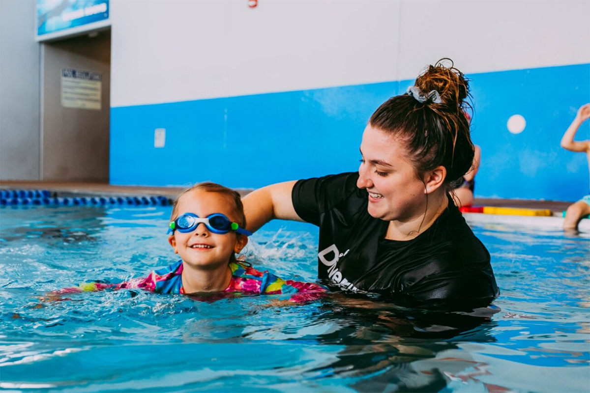 Swim Teacher and Girl Swim Student