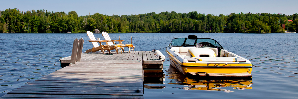 boat and dock on lake